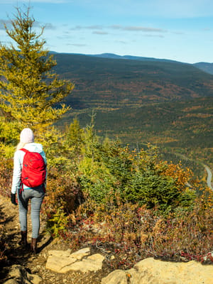 hiker-explores-a-scenic-mountain-trail-during-autumn